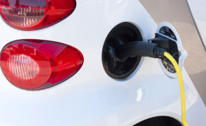 White electric car charging in College Park, MD