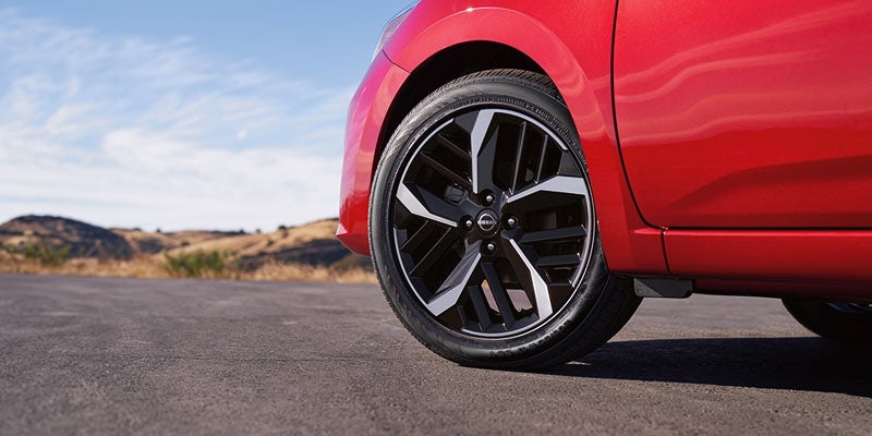 Red 2024 Versa And Zoomed in On Wheel College Park, MD